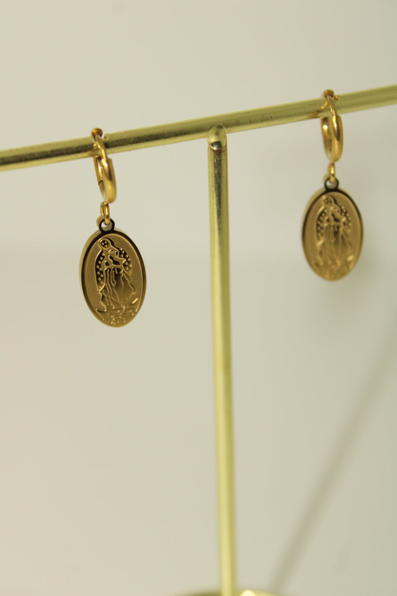Our Lady hoop earring